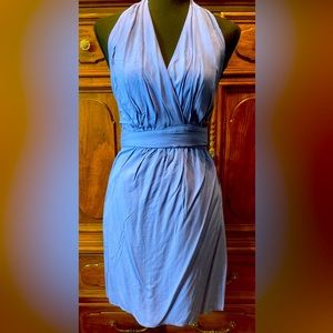 Beautiful blue tie dress. Tie wraps around waist to close dress.